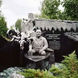 гранитные скульптуры памятники надгробия портрет из камня