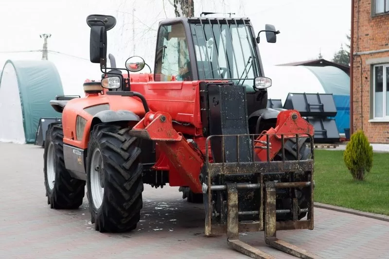 Дизельный телескопический погрузчик б/у Manitou MT1235ST