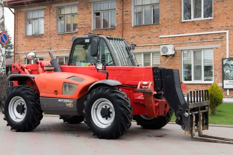 Дизельный телескопический погрузчик б/у Manitou MT1235ST 2